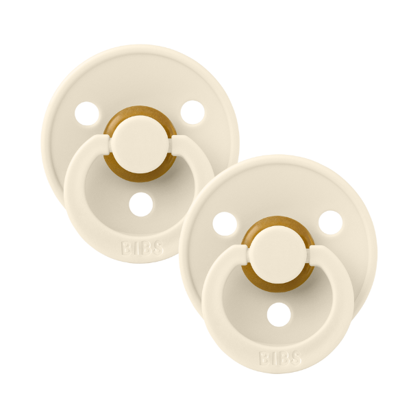 Pair of ivory BIBS baby pacifiers sold by Meridian Baby.