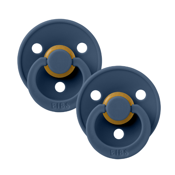 Pair of steel blue BIBS baby pacifiers sold by Meridian Baby.