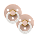 Pair of light pink BIBS baby pacifiers sold by Meridian Baby.