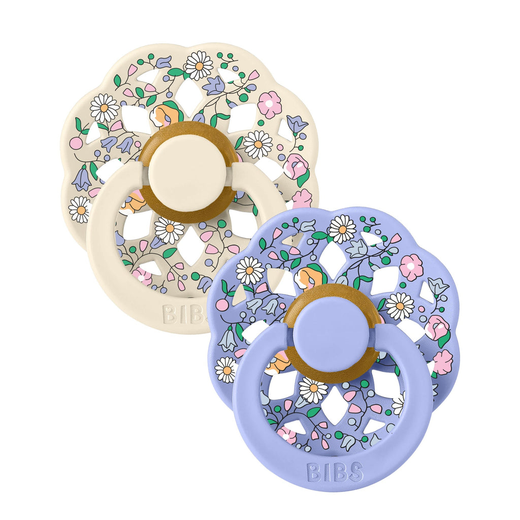 Two BIBS Liberty Print baby pacifiers sold by Meridian Baby.