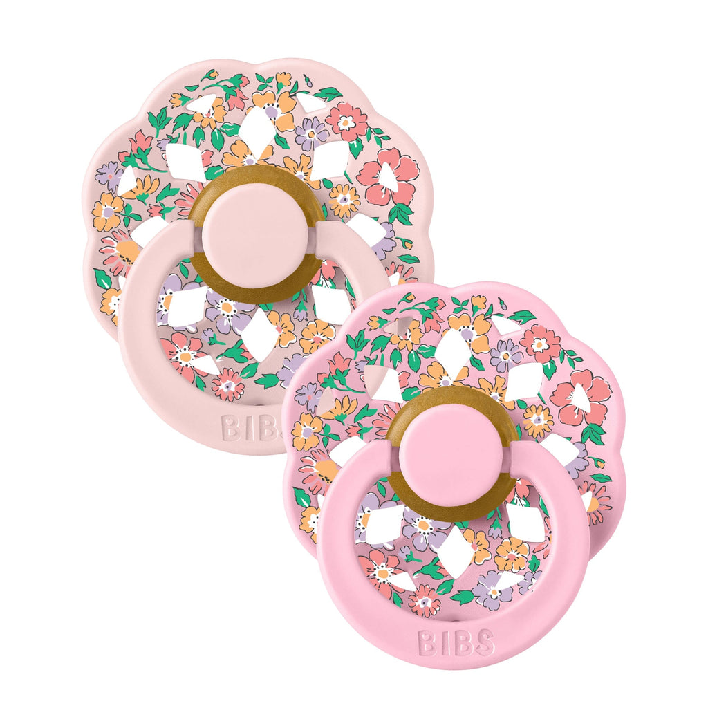 Two pink BIBS Liberty Print baby pacifiers sold by Meridian Baby.