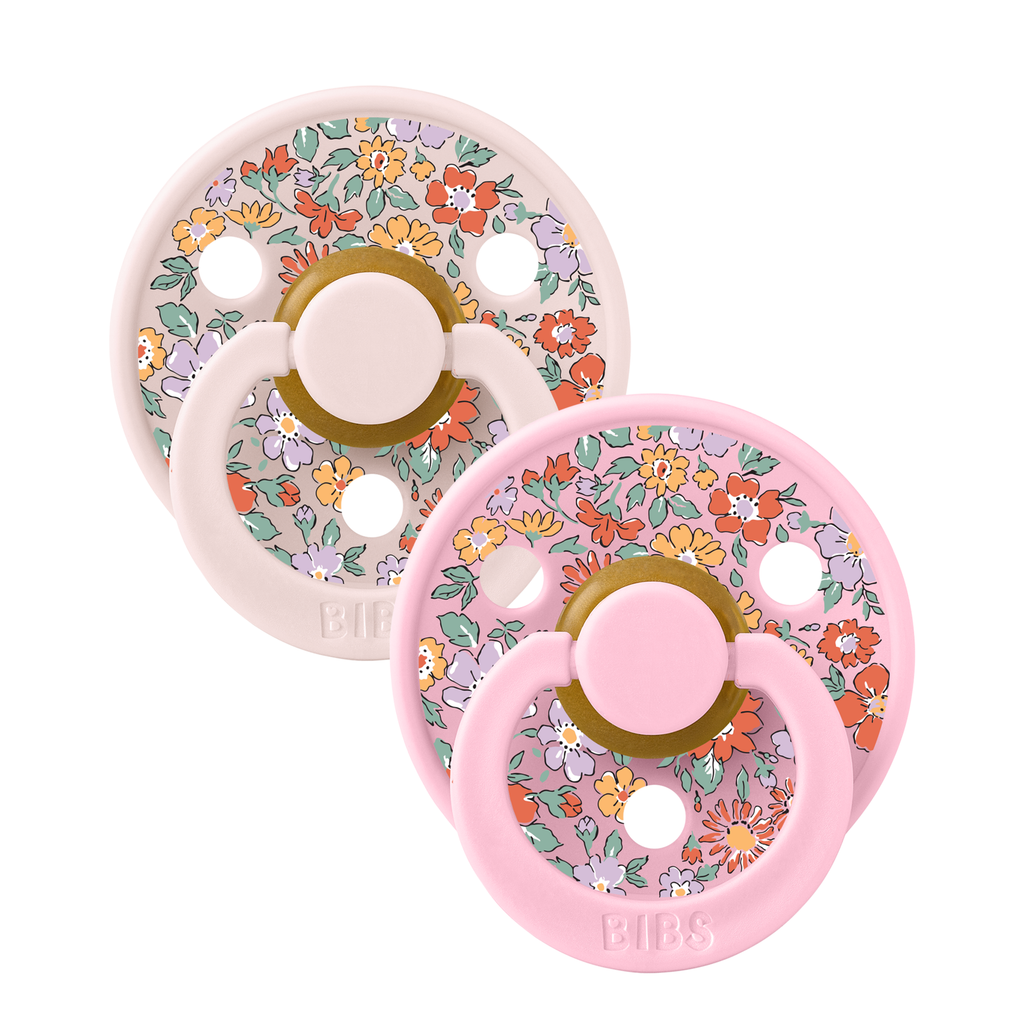 Two pink BIBS Liberty Round baby pacifiers sold by Meridian Baby.