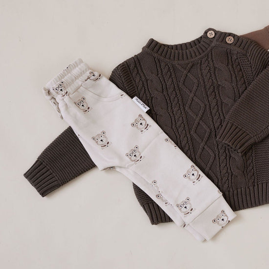 Aster & Oak brown cable knit sweater and beige pants with byron bear patterns from Meridian Baby
