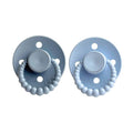 Two blue pacifiers with beaded designs on a white background