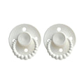 Two white baby pacifiers with decorative beads on a white background