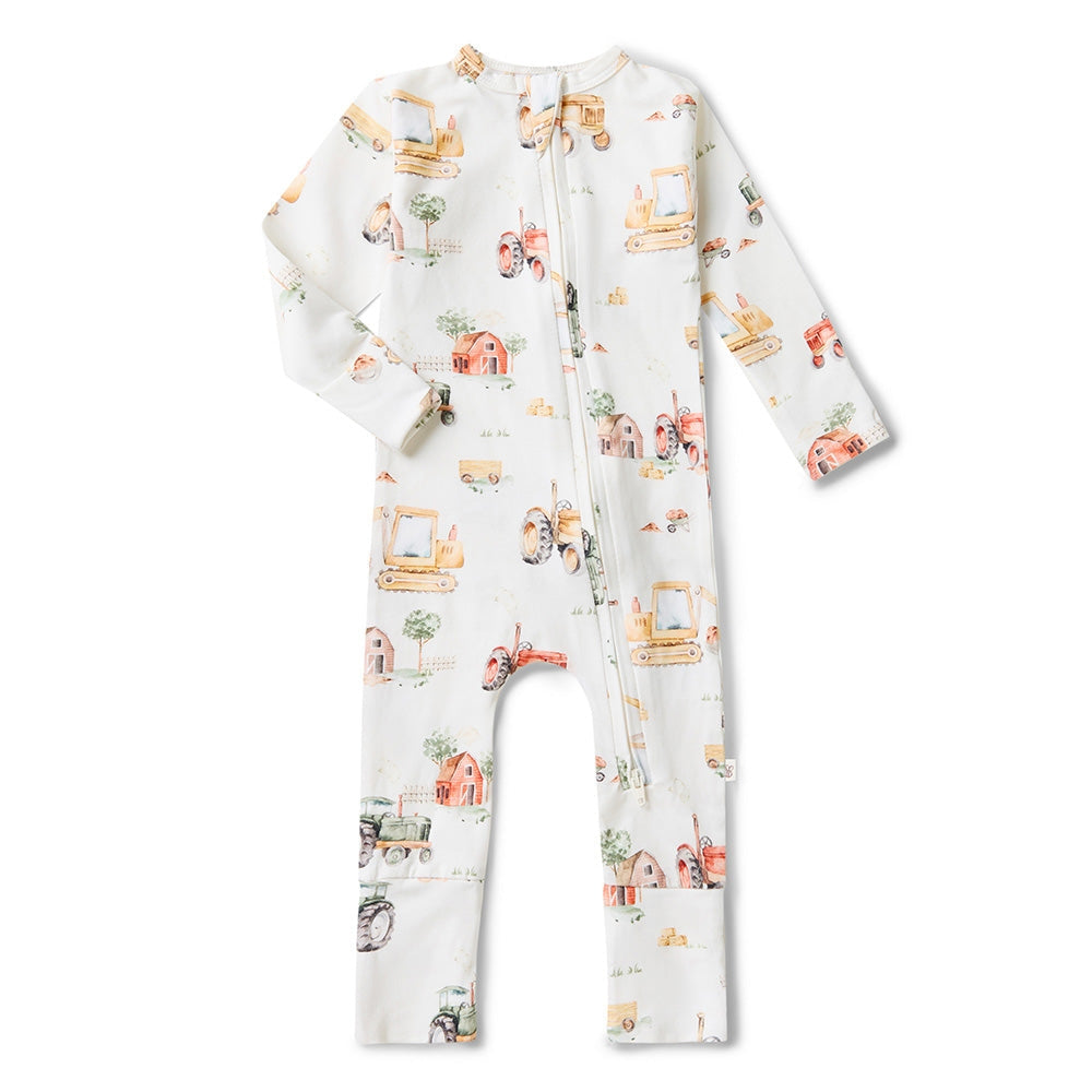 Baby onesie with vehicle pattern on a white background