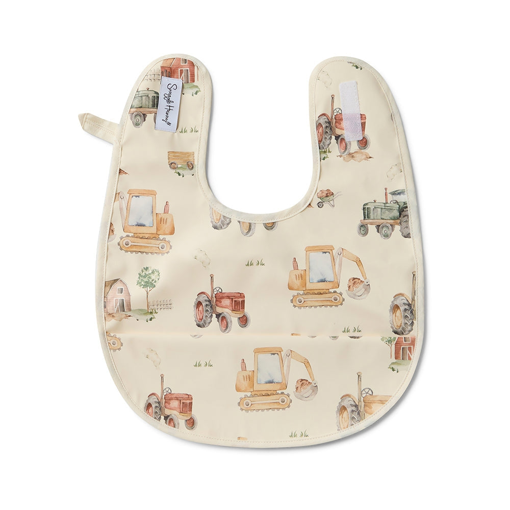 Baby bib with construction vehicle pattern on a white background