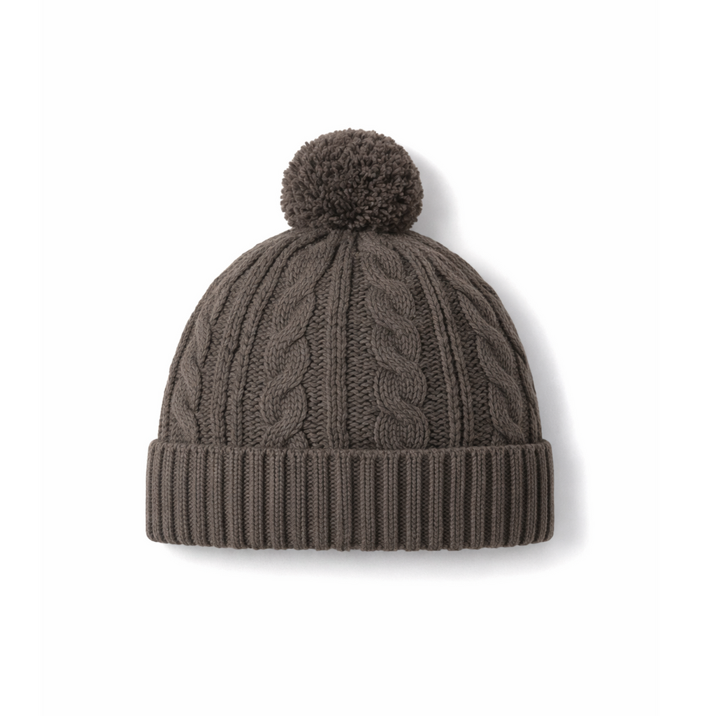 Aster & Oak brown cable knit beanie with a pom-pom from Meridian Baby