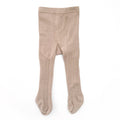 Beige tights on a white background