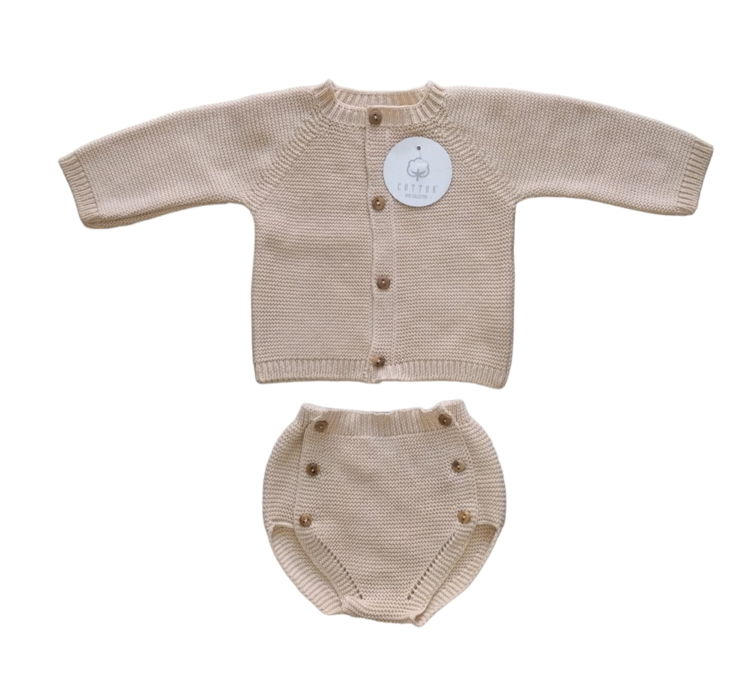 Beige baby knitted outfit with cardigan and bloomers on a white background