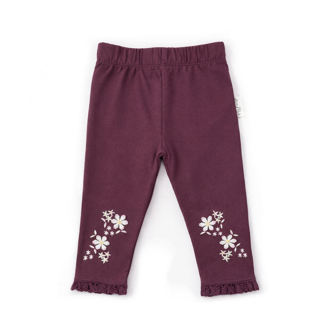 Maroon leggings with floral patterns on a white background