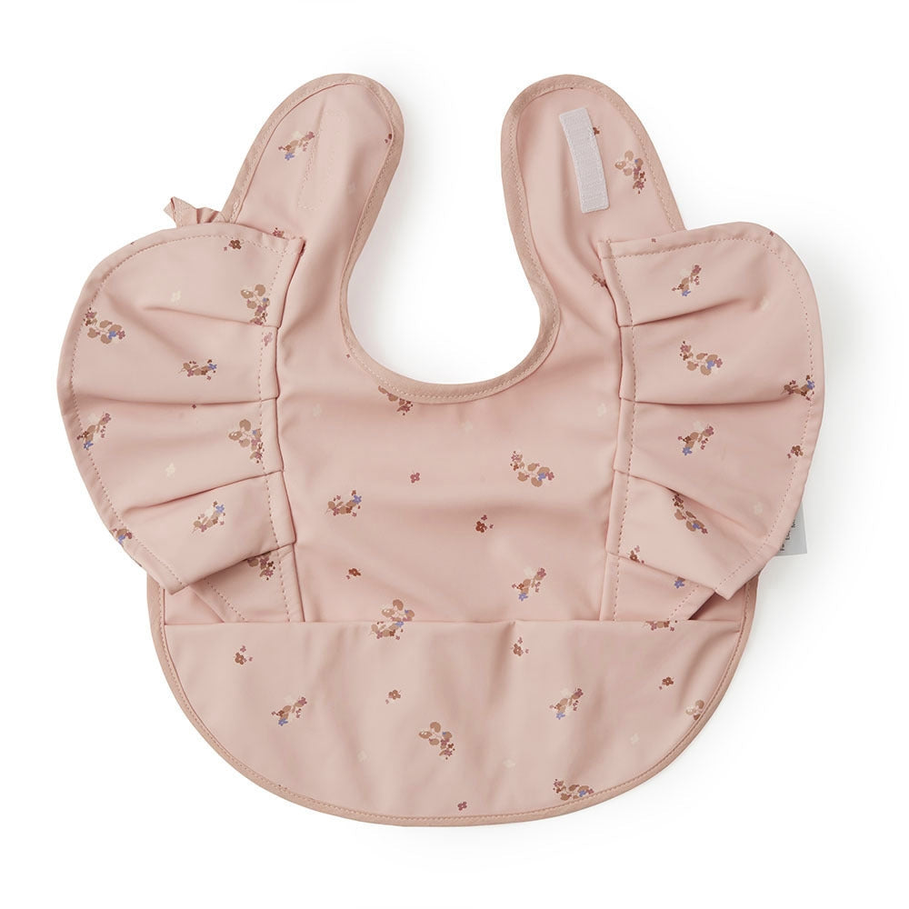 Snuggle Hunny pink frill baby bib with floral patterns from Meridian Baby