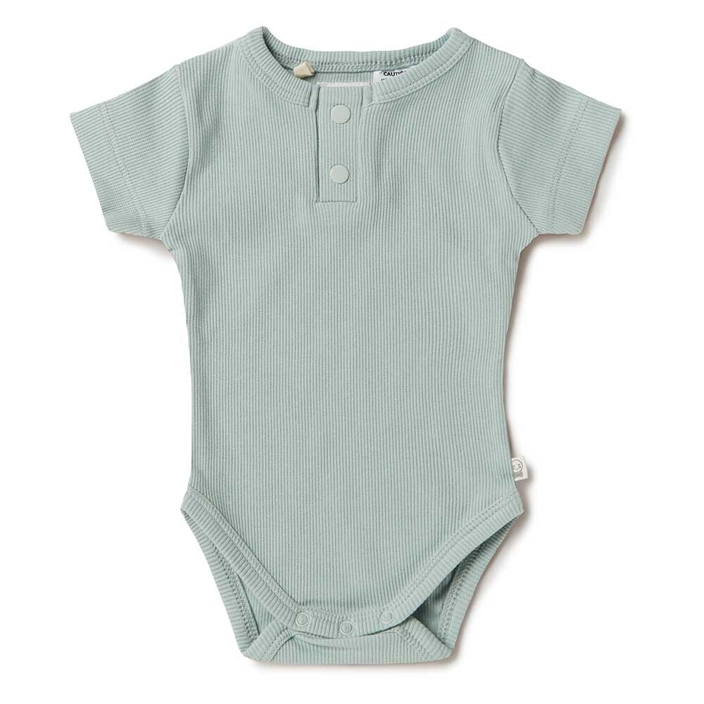 Green ribbed baby onesie on a white background