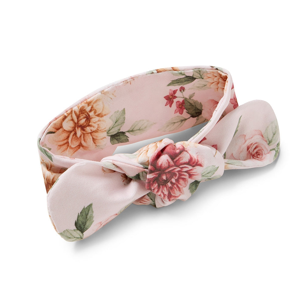 Floral headband with a bow on a white background