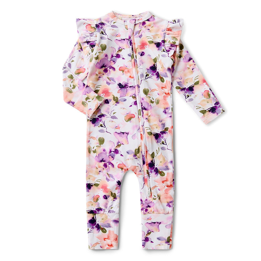 Floral-patterned baby romper on a white background