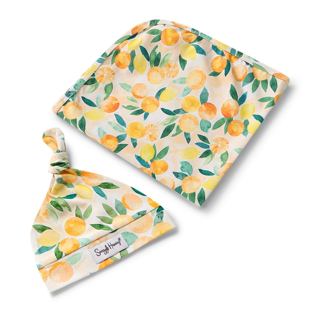 Snuggle Hunny citrus printed wrap with matching knot beanie gift set from Meridian Baby.