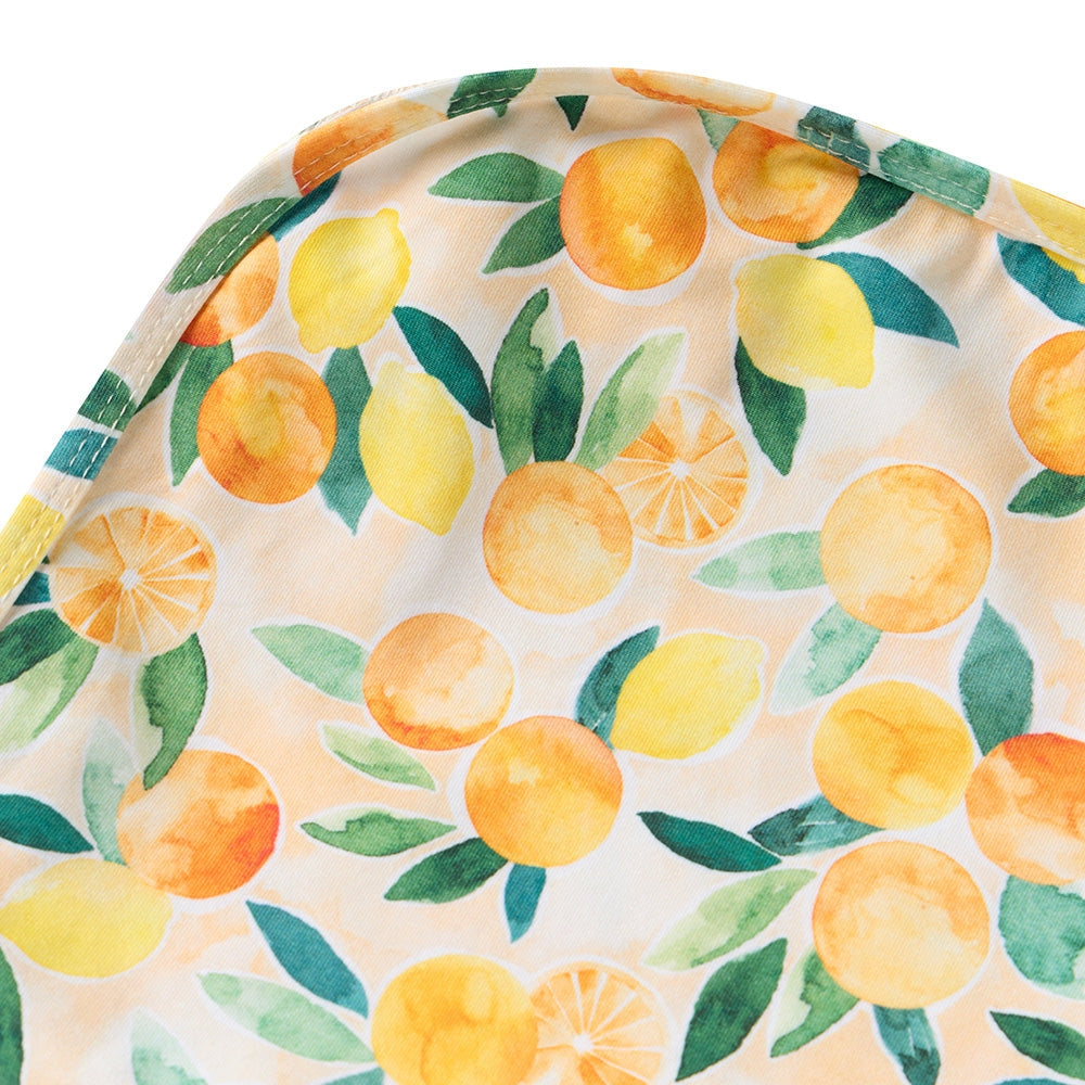 Close up view of Snuggle Hunny Sunny Citrus baby wrap from Meridian Baby.