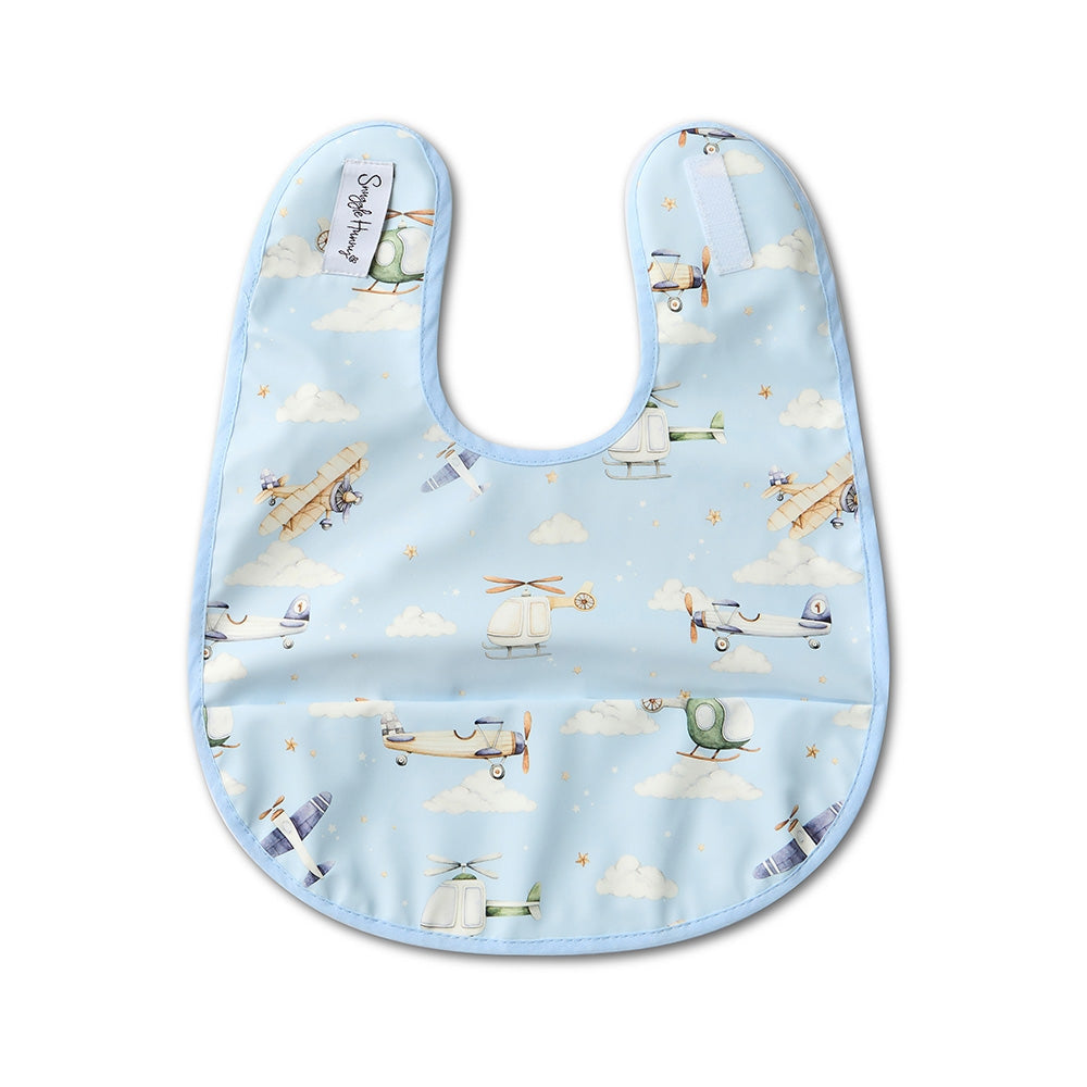 Snuggle Hunny blue feeding bib with airplane designs from Meridian Baby